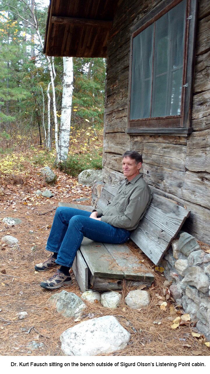 Kurt Fausch on the bench at the Listening Point cabin